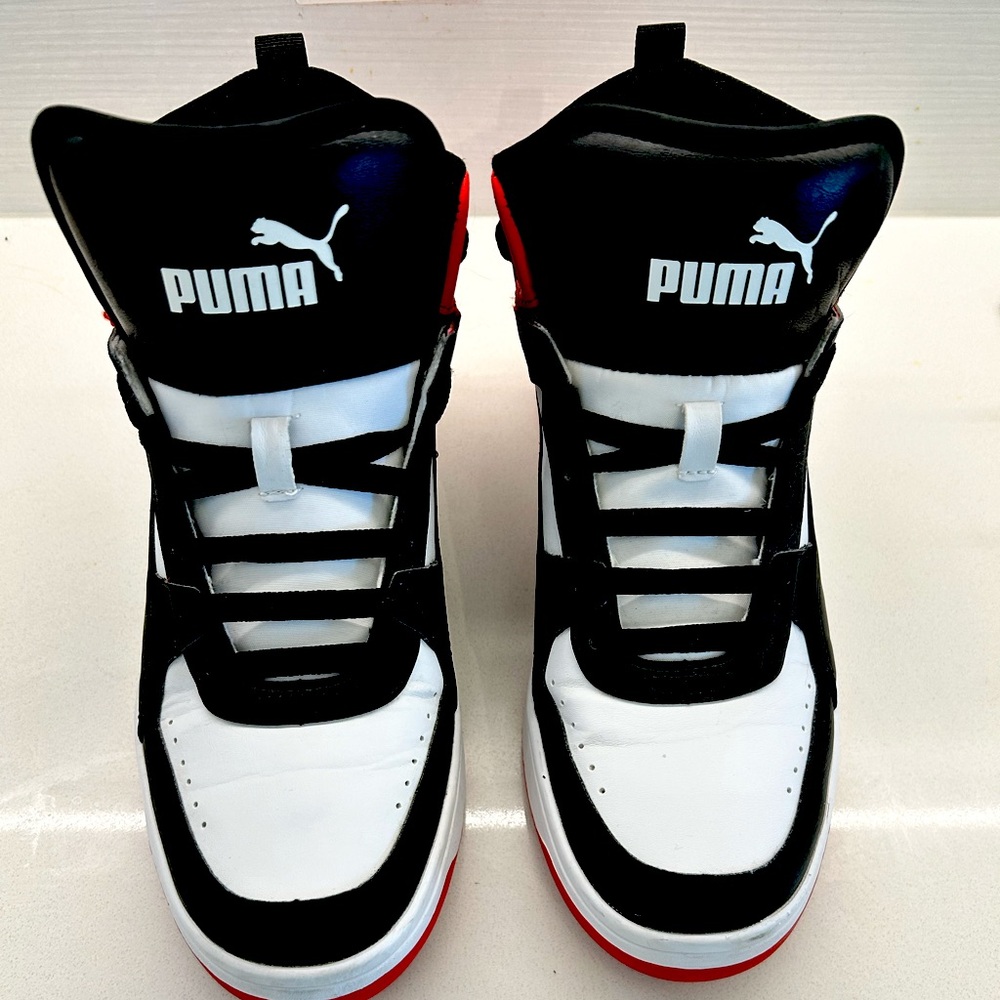 Barely worn Puma high tops size 8
